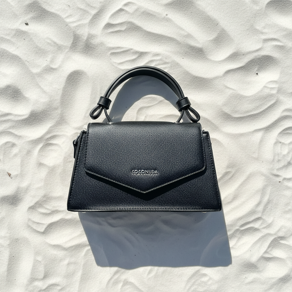 Coconuda Mini Bag Saffiano Nera Fronte – White Sand Flat Lay