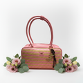 Pink raffia bowling bag with charm